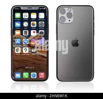 KIEV, UKRAINE - JANUARY 24, 2021: Front and back view of new Apple  iPhone 11 Pro Space Gray smartphone isolated on white background with clipping pat Stock Photo