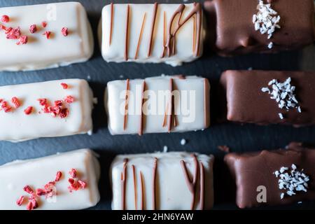 set of handmade chocolate sweet truffle or marzipan candies Stock Photo