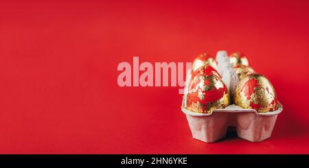 Red painted Easter eggs on red background Stock Photo