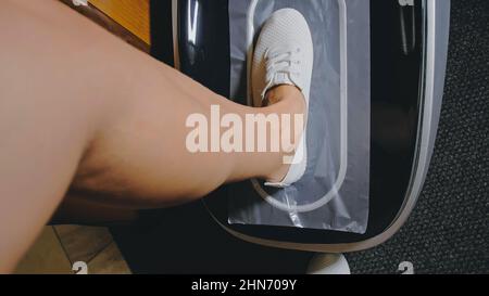 Automatic Thermal Shrinkable Shoe Cover Laminating Machine. Clos Stock  Photo - Alamy