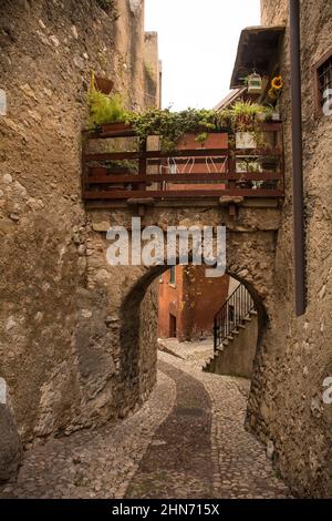 The historic castle quarter, Via Posterna, in winter in the small town of Malcesine on the north shore of lake Garda, Verona Province, Veneto, Italy Stock Photo