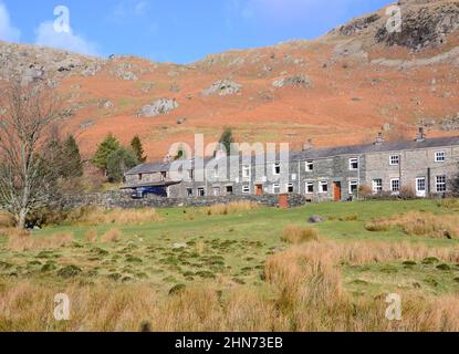 Miners cottages in the valley of Coniston Copper Mines, Lake District or Lakes, Cumbria, England, United Kingdom, British Isles, on a sunny day. Stock Photo