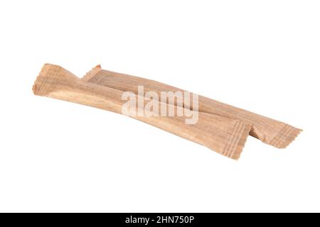 Craft paper two sugar sticks isolated on the white background Stock Photo