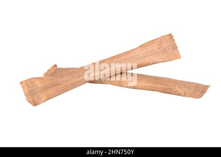 Craft paper two sugar sticks isolated on the white background Stock Photo