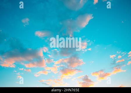Pastel clouds at sunset. Soft colored clouds at sunset or sunrise. Heaven or peace or relaxation concept. Stock Photo