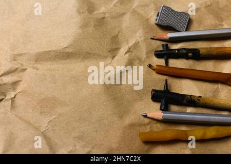 Tools for decorating Paschal eggs, Pysankas. Rustic background. Collection pens and pencils. Homemade pen for drawing eggs. Preparation for holiday Stock Photo