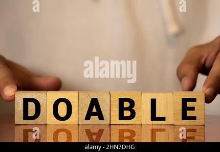 doable colorful word on the wooden background Stock Photo
