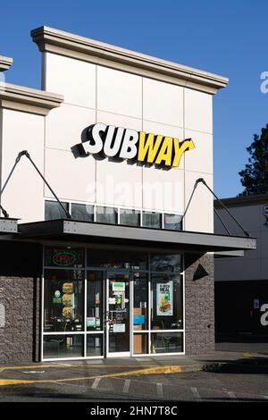 Burlington, WA, USA - February 12, 2022; Frontage of Subway sandwich store in Burlington Washington with logo name above entrance door Stock Photo