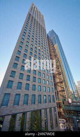 The view of skyscrapers containing mostly businesses, hotels, and restaurants in the Shiodome Sio-Site area of Minato. Tokyo. Japan Stock Photo