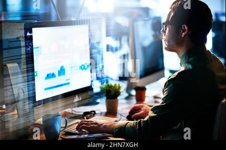 Working on brand new code. Cropped shot of a male computer programmer working on new code. Stock Photo