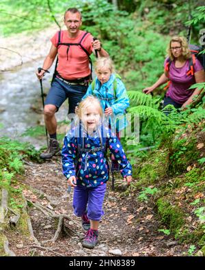 Hike with the family through the Hölltobel to Gerstruben and back via the Rautweg. Stock Photo