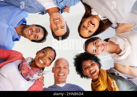 Theres no better work than teamwork. Shot of a group of casually dressed businesspeople in the office. Stock Photo
