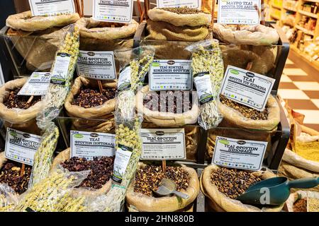 21 October 2021, Thessaloniki, Greece: Assortment of various teas with inscriptions in Greek on the market Stock Photo