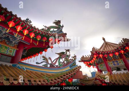 Kuala Lumpur, Malaysia - Feb 6th, 2022: The roof with carvings and lighted red lanterns hanging on the roof at Thean Hou Temple, Kuala Lumpur Malaysia Stock Photo