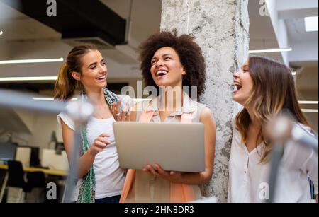 Group of happy friendly multiethnic business people having fun, working together in office Stock Photo