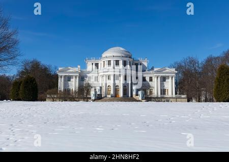 Elagin Palace in front of a snowy field among trees early spring (St. Petersburg, Russia) Stock Photo