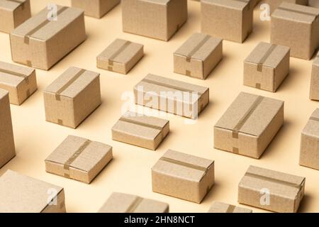 Lots of cardboard boxes pattern on brown background. Stock Photo