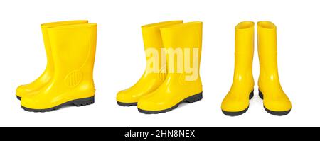 Yellow rubber boots isolated on white background. Stock Photo