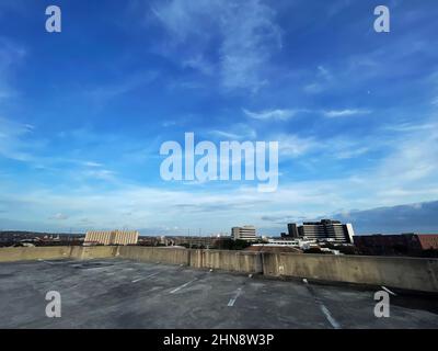 Augusta, Ga USA - 12 13 21: Augusta Ga hospital medical district downtown cityscape edge of the top of a parking deck Stock Photo