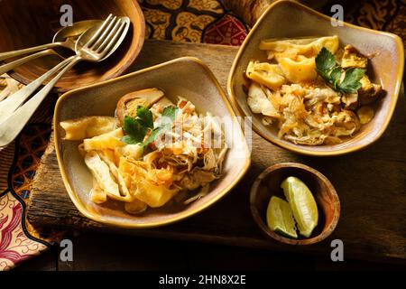 Timlo Solo.  Javanese clear soup with egg roll, chicken, and soy-egg from Solo / Surakarta, Central Java Stock Photo