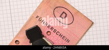 an old german driver's license with the word 'driver's license' and a car key Stock Photo