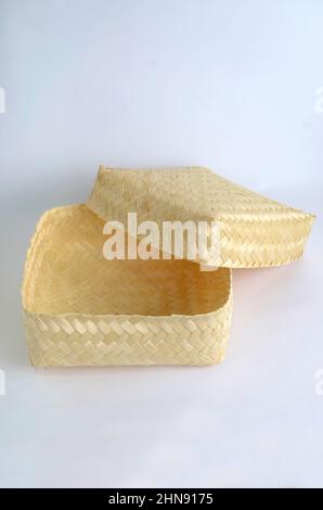 Besek, traditional hand made containers made of bamboo isolated on white background Stock Photo