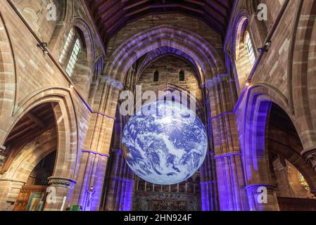 Gaia exhibition of planet eart at St. Chad's church in Kirkby, north west England on its tour of the world. The huge art installation 'Gaia', by artis Stock Photo