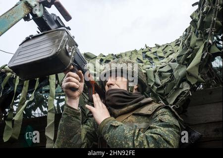 Pro-Russian Serviceman on the observation post watching for a Ukrainian drone on positions of the people's militia of the Donetsk People's Republic, Donbas, Ukraine on February 10, 2022. Russia said on February 15 it is pulling back some of its troops from near Ukraine after a build-up raised fears of an invasion. The defence ministry said that large-scale drills continued but that some units were returning to their bases. Ukraine warned to wait to see proof of the pull-out, saying 'when we see the withdrawal, then we'll believe the de-escalation'. Photo by Svetlana Kisileva/ABACAPRESS.COM Stock Photo