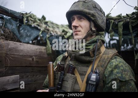 Pro-Russian Serviceman on the observation post watching for a Ukrainian drone on positions of the people's militia of the Donetsk People's Republic, Donbas, Ukraine on February 10, 2022. Russia said on February 15 it is pulling back some of its troops from near Ukraine after a build-up raised fears of an invasion. The defence ministry said that large-scale drills continued but that some units were returning to their bases. Ukraine warned to wait to see proof of the pull-out, saying 'when we see the withdrawal, then we'll believe the de-escalation'. Photo by Svetlana Kisileva/ABACAPRESS.COM Stock Photo