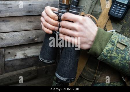 Pro-Russian Serviceman on the observation post watching for a Ukrainian drone on positions of the people's militia of the Donetsk People's Republic, Donbas, Ukraine on February 10, 2022. Russia said on February 15 it is pulling back some of its troops from near Ukraine after a build-up raised fears of an invasion. The defence ministry said that large-scale drills continued but that some units were returning to their bases. Ukraine warned to wait to see proof of the pull-out, saying 'when we see the withdrawal, then we'll believe the de-escalation'. Photo by Svetlana Kisileva/ABACAPRESS.COM Stock Photo