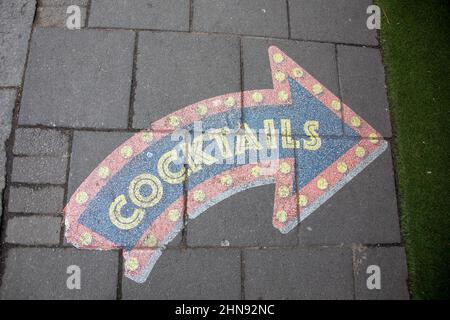 Cocktail sign on the pavement Stock Photo