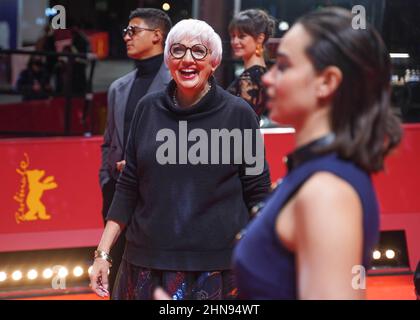 Berlin, Germany. 14th Feb, 2022. Claudia Roth (Bündnis90/Die Grünen), Minister of State for Culture, is surrounded by Shooting Stars 2022 on the red carpet. The 72nd International Film Festival will take place in Berlin from Feb. 10 to 20, 2022. (to dpa-Extra 'A film festival in Corona times - how does that work?') Credit: Joerg Carstensen/dpa/Alamy Live News Stock Photo