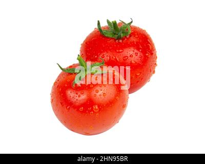 Fresh red tomatoes with wet drops isolated on the white background Stock Photo