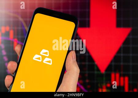 XAU gold metal logo, stock trade and price chart, red finance background. Business concept Stock Photo