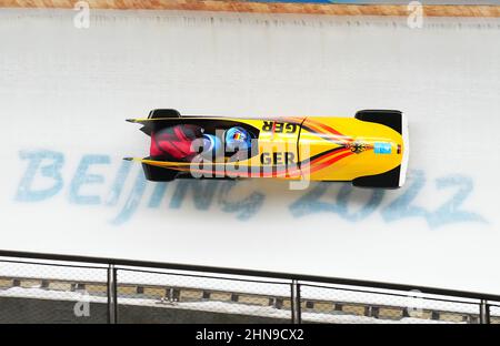Beijing, China. 15th Feb, 2022. Bobsleigh: Olympics, two-man bobsleigh, men, 3rd run at Yanqing National Sliding Centre, Francesco Friedrich and Thorsten Margis in the ice channel. Credit: Michael Kappeler/dpa/Alamy Live News Stock Photo