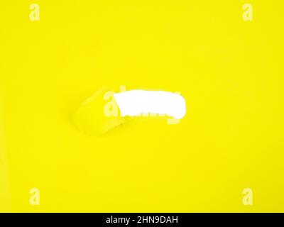 Yellow torn sheet of paper with whole space for text Stock Photo