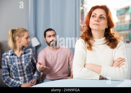 The son-in-law makes claims to the mother-in-law Stock Photo