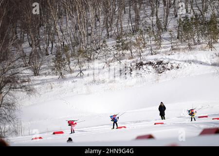 Zhangjiakou, China's Hebei Province. 15th Feb, 2022. Athletes compete during biathlon men's 4x7.5km relay at National Biathlon Centre in Zhangjiakou, north China's Hebei Province, Feb. 15, 2022. Credit: Zhan Yan/Xinhua/Alamy Live News Stock Photo