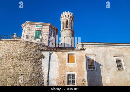 Lighthouse in the Piran town on Adriatic sea, one of major tourist attractions in Slovenia, Europe. Stock Photo