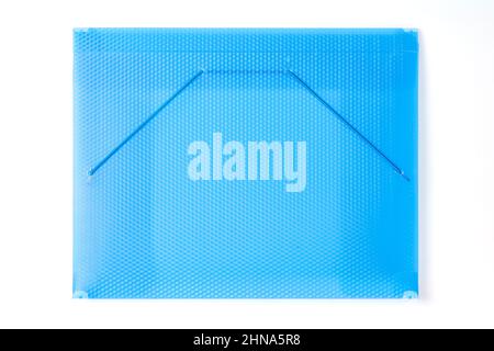 Blue plastic transparent folder with copy space on it close up. Top view isolated on white, clipping path included Stock Photo