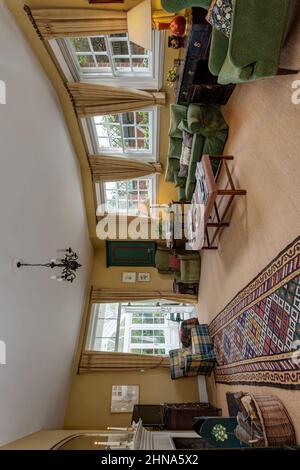 Newmarket, Suffolk - October 23 2014: Traditional styled stately living room traditionally furnished in grand country home. Stock Photo