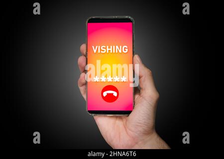 Robocall and warning alert on smartphone screen. Smartphone cybersecurity concept Stock Photo
