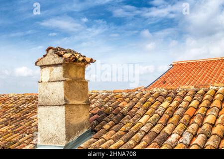 Red scarf roof wit a chimney on house in Istria, Croatia, Europe. Stock Photo