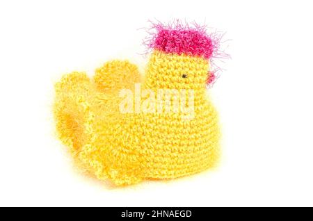 Handmade Easter toy - yellow chicken for keeping Easter eggs and table decoration. Stock Photo