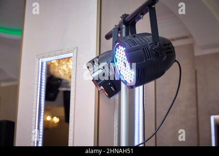 lighting equipment or color music in the restaurant hall. Stock Photo