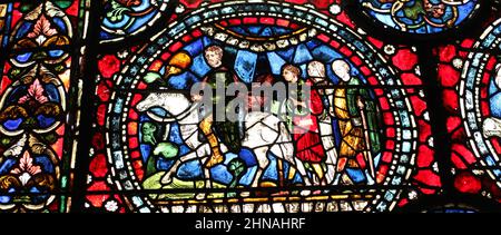 Stained Glass Panel from Canterbury Cathedral depicting Pilgrims on their way to St Thomas' shrine. Stock Photo