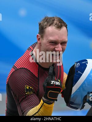 Beijing, China. 15th Feb, 2022. Francesco Friedrich of Germany celebrates after the bobsleigh 2-man heat of Beijing 2022 Winter Olympics at National Sliding Centre in Yanqing District, Beijing, capital of China, Feb. 15, 2022. Credit: Sun Fei/Xinhua/Alamy Live News Stock Photo