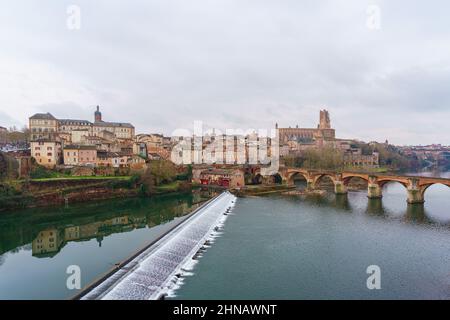 Albi city skyline, Tarn river and Albi Cathedral (Cathedral Basilica of Saint Cecilia) at dusk Stock Photo