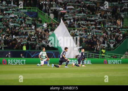 Lisbon, Portugal. 15th Feb, 2022. Players kneel at the start of the Round Of Sixteen Leg One - UEFA Champions League match between Sporting CP and Manchester City at Alvalade stadium in Lisbon, Portugal, on February 15, 2022. (Credit Image: © Pedro Fiuza/ZUMA Press Wire)