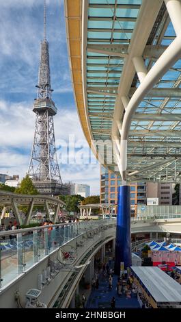Nagoya, Japan – October 20, 2019: The view of TV tower and three-dimensional park Oasis 21 with its glass roof in the center of Nagoya city. Japan Stock Photo